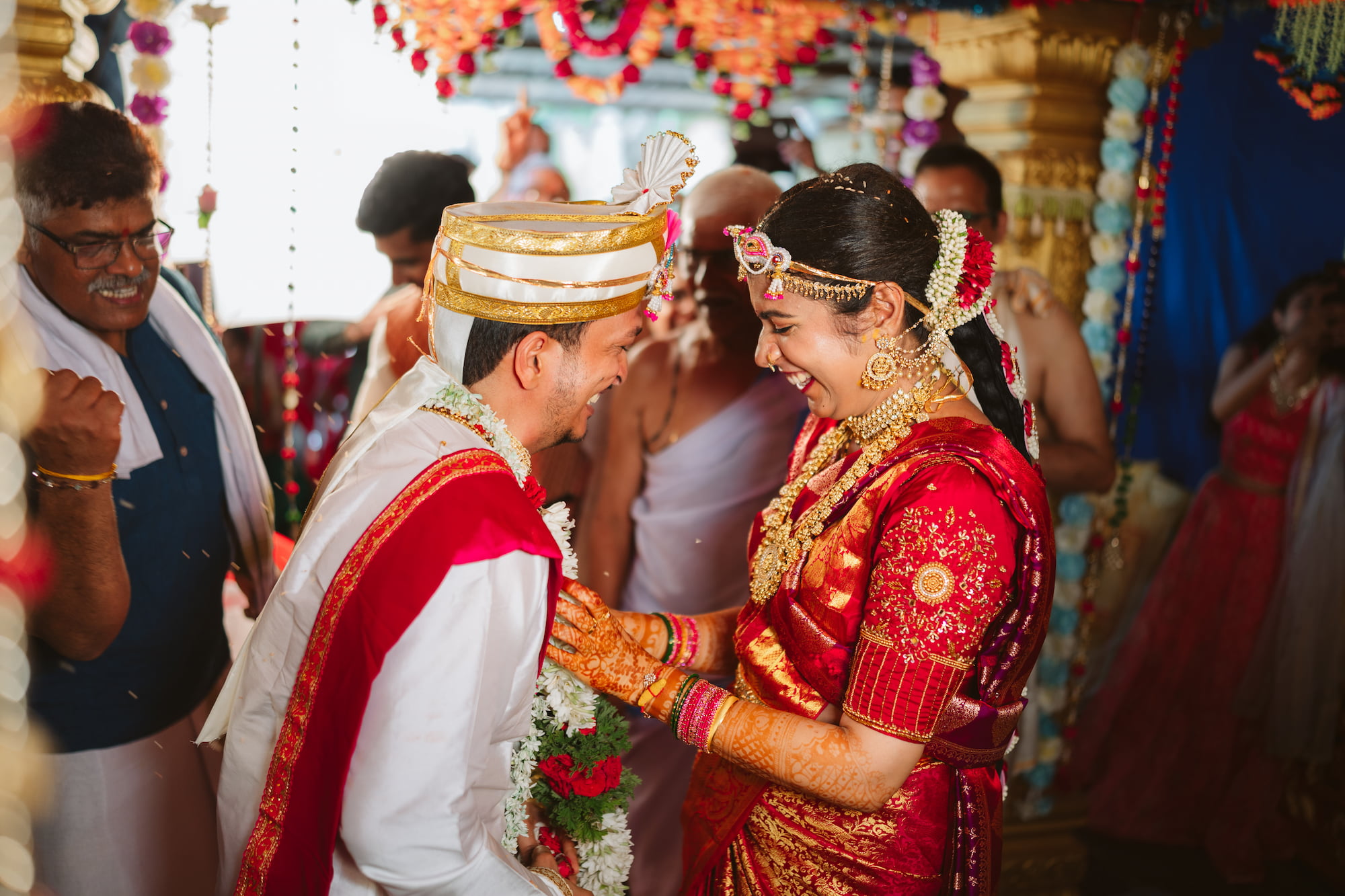 Candid wedding photograph of guests celebrating
